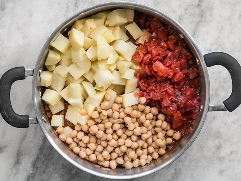 Potatoes Tomatoes and Chickpeas in pot