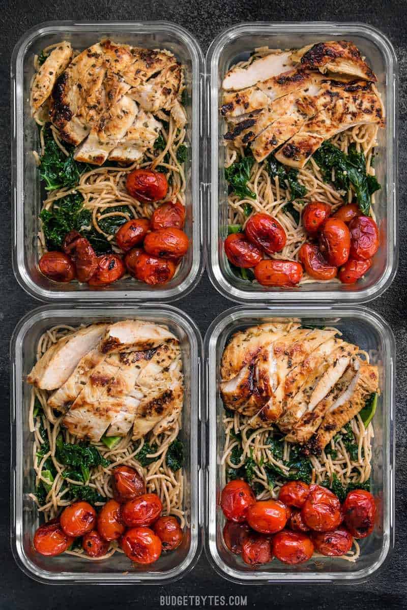 This Garlic Parmesan Kale Pasta Meal Prep includes Garlic Marinated Chicken and brightly flavored blistered tomatoes for a well rounded and delicious meal! BudgetBytes.com