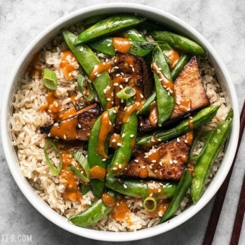 These vegan Soy Marinated Tofu Bowls are full of rich flavors and plenty of texture to keep your taste buds happy and your belly full. BudgetBytes.com