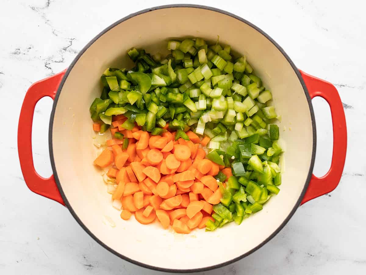 Celery, carrot, and bell pepper added to the pot