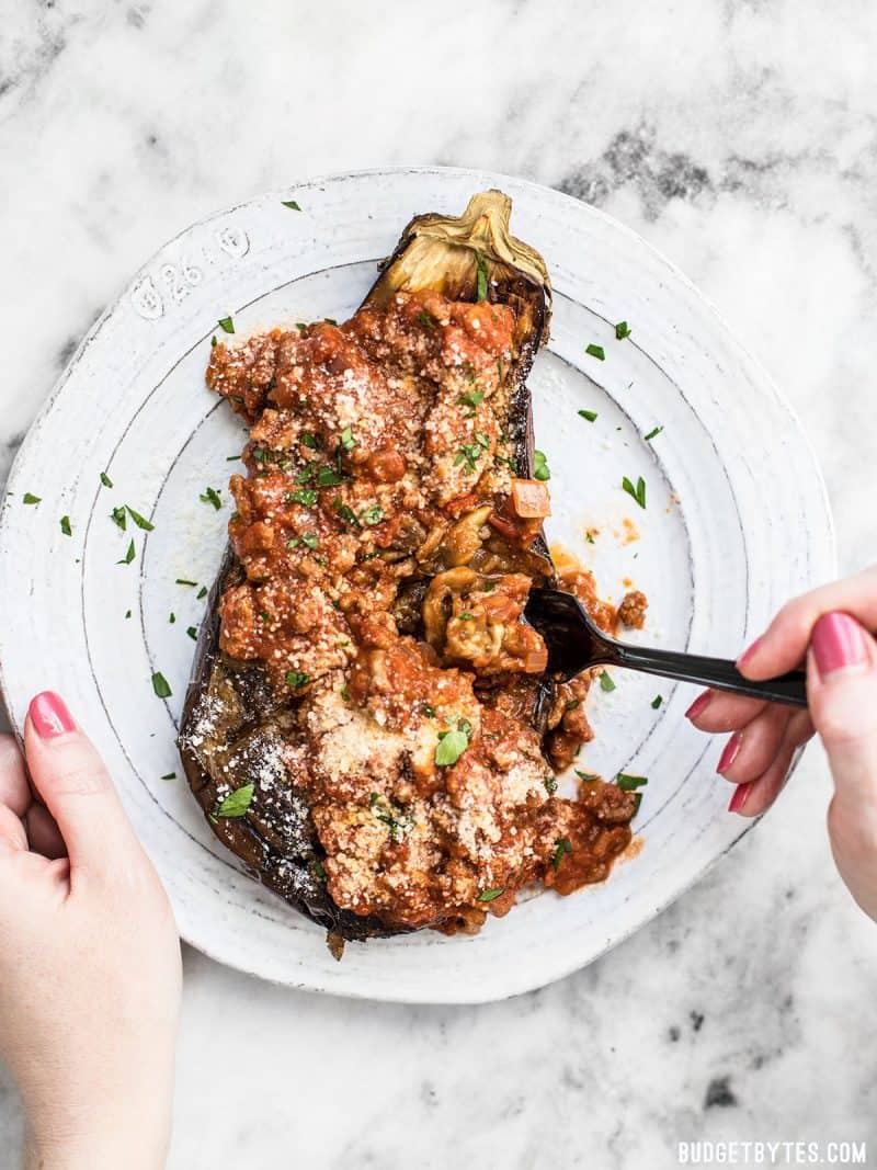 Roasted Eggplant with Meat Sauce being eaten with a fork