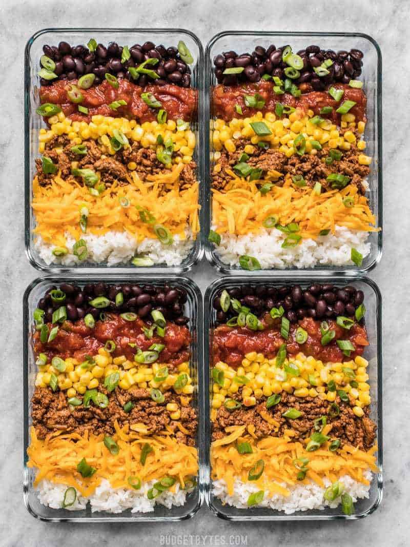 Build Burrito Bowls in the meal prep containers