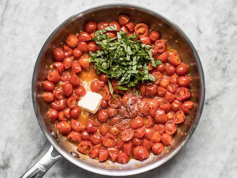 Add Basil Butter Pepper and Salt to Tomatoes