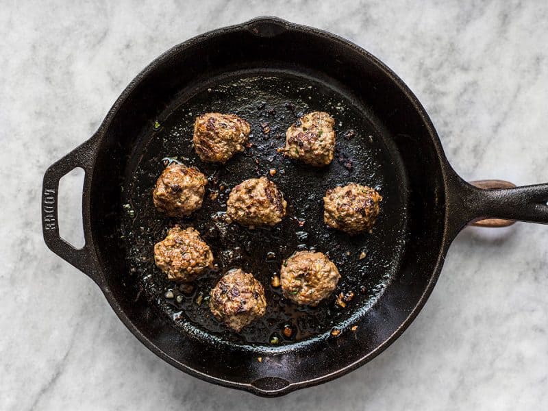 Cooked Beef Kofta Meatballs in cast iron skillet