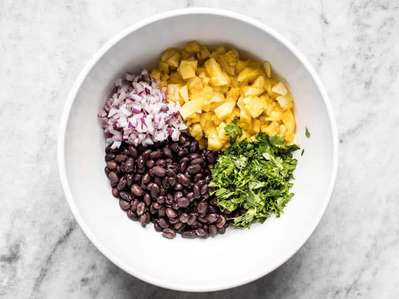 Pineapple Black Bean Salsa ingredients in a bowl