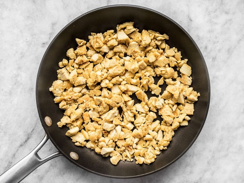 Fried tofu pieces in the skillet