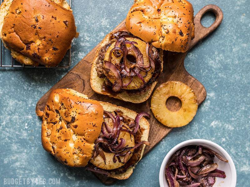 These rich and juicy Hawaiian Burgers are flavored with sweet pineapple, tangy teriyaki sauce, savory green onions, and creamy Monterey jack cheese. Budgetbytes.com