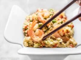 By adding a few extra ingredients to your rice cooker, you can cook an entire meal at once. This Teriyaki Shrimp and Rice is an easy and healthy alternative to take out. Budgetbytes.com