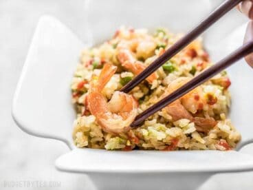 By adding a few extra ingredients to your rice cooker, you can cook an entire meal at once. This Teriyaki Shrimp and Rice is an easy and healthy alternative to take out. Budgetbytes.com