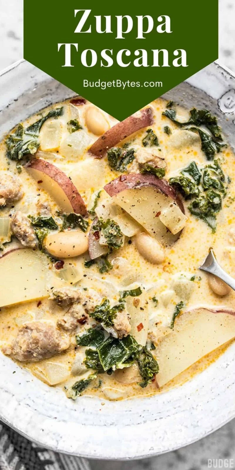 close up view of a bowl of zuppa toscana with title text at the top