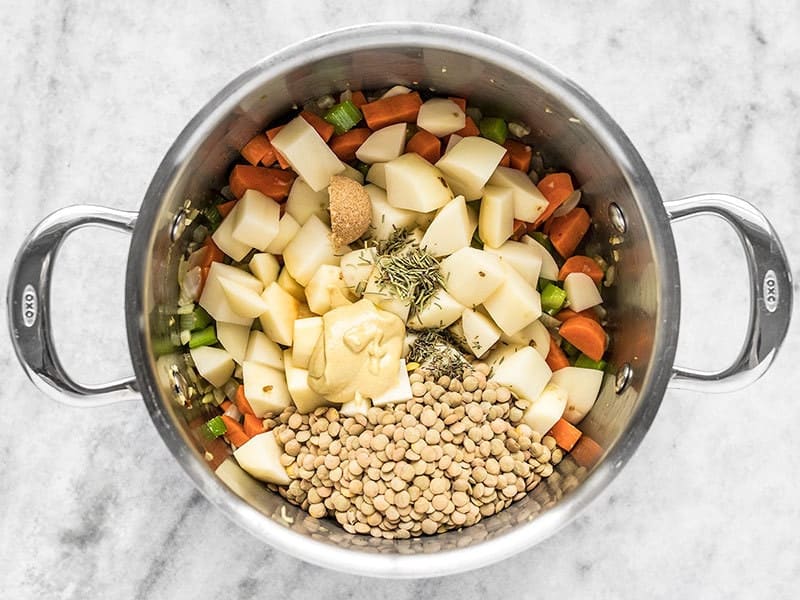 Add Potatoes Lentils and Seasoning to Pot