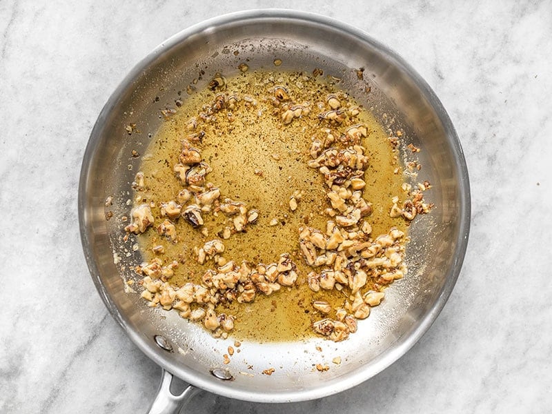 Add dried sage to brown butter in the skillet