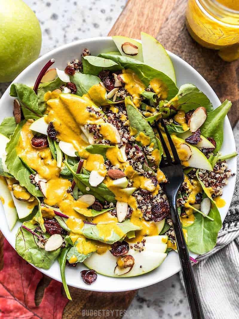 Autumn Quinoa Salad drenched in Lemon Turmeric Dressing ready to eat.