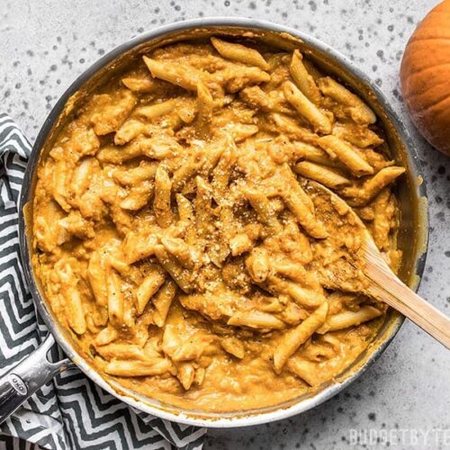 Skillet full of smoky, spicy, and creamy Chipotle Pumpkin Pasta.