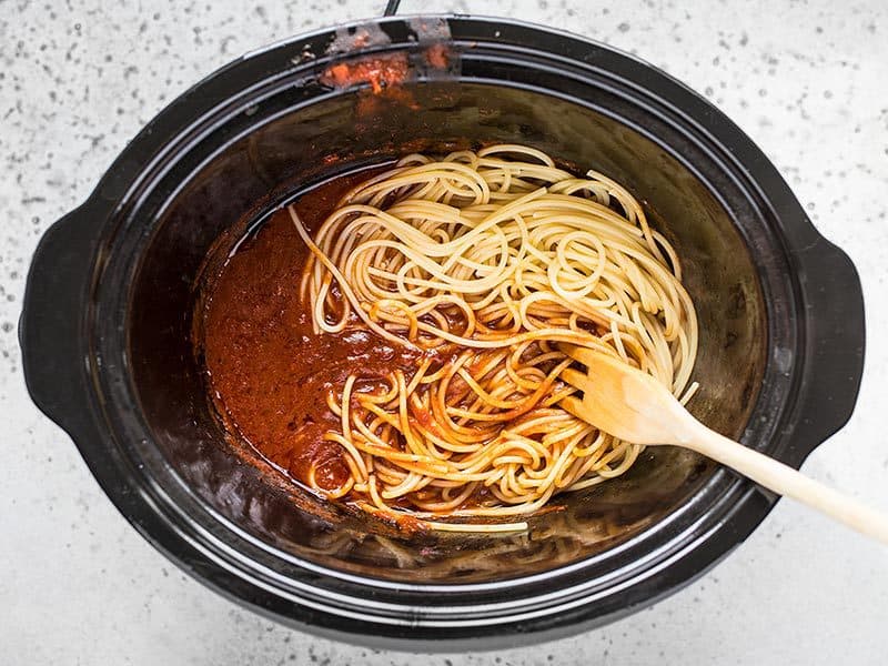 Add Cooked Spaghetti to the Slow Cooker