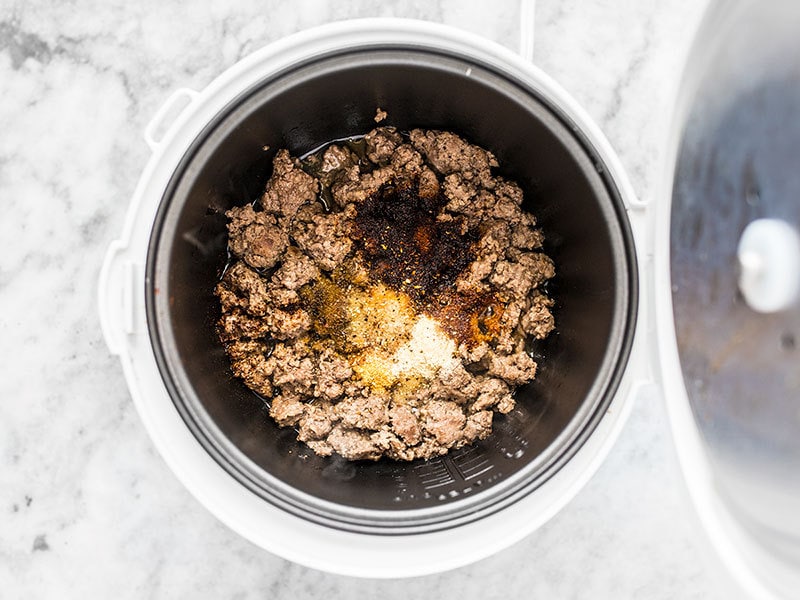 Add Spices to Browned Beef in Rice Cooker