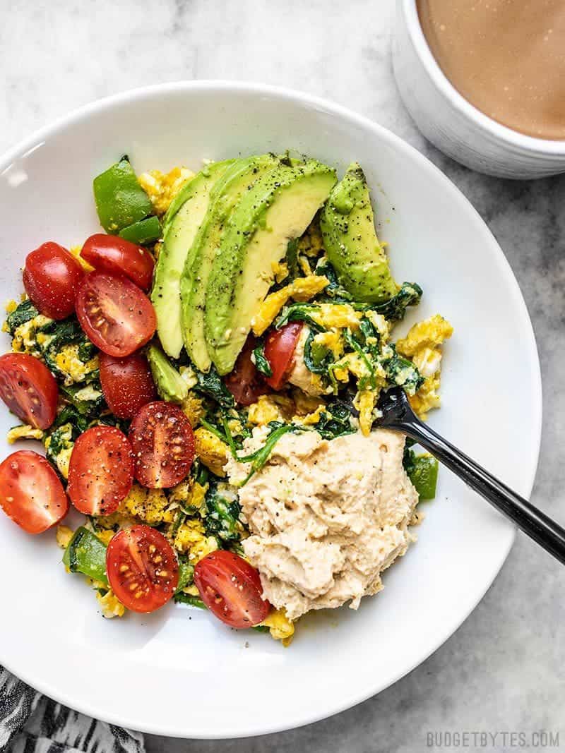 A big bowl of Vegetable Breakfast Scrambles with fork.