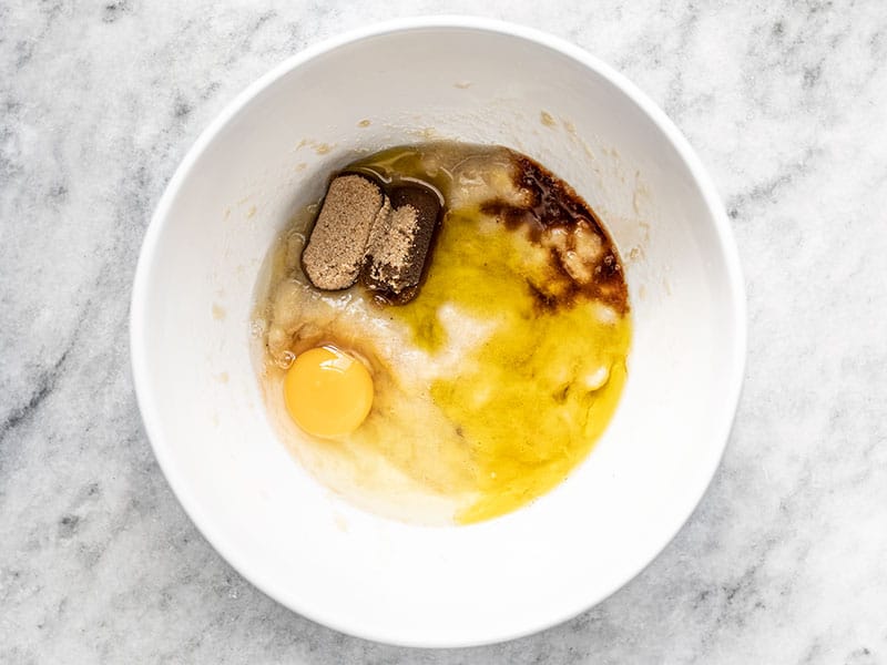 Wet ingredients for Banana Flax Muffins in a bowl