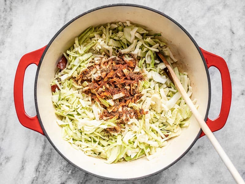 Cabbage Water and Spices in the pot with smoked sausage