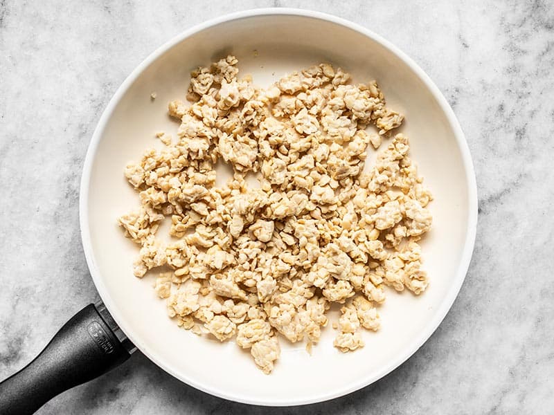 Crumbled tempeh in the skillet