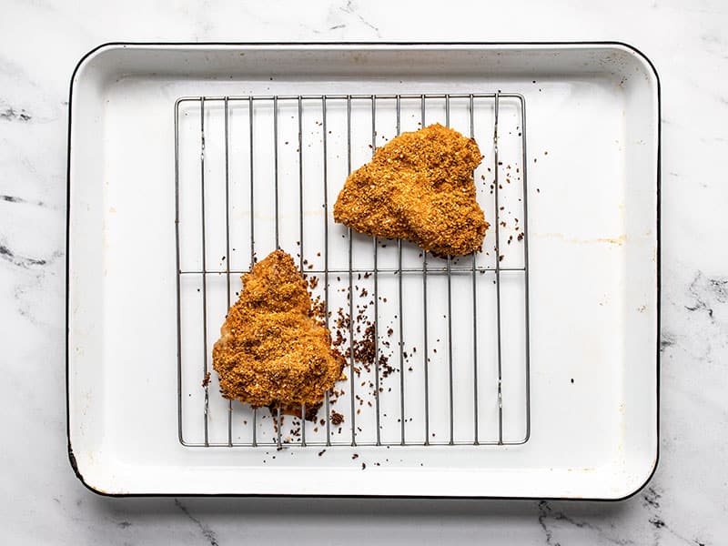 Baked Spicy Chicken Breast pieces on baking sheet