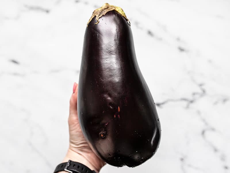 Eggplant in hand for size