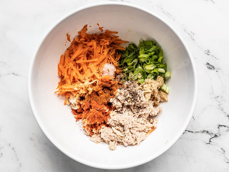 Ingredients for Sweet and Spicy Tuna Salad in a bowl, unmixed