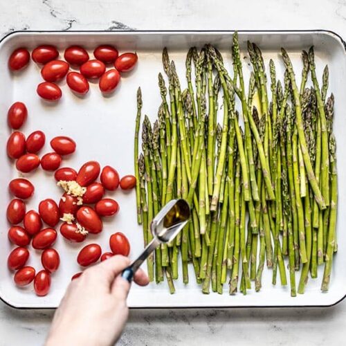 Asparagus and Tomatoes on the baking sheet