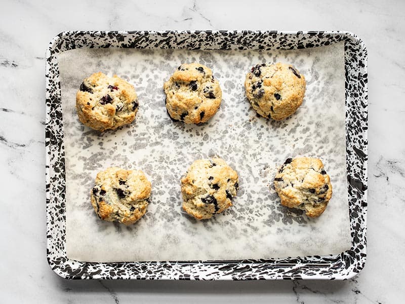 Baked blueberry biscuits on the baking sheet