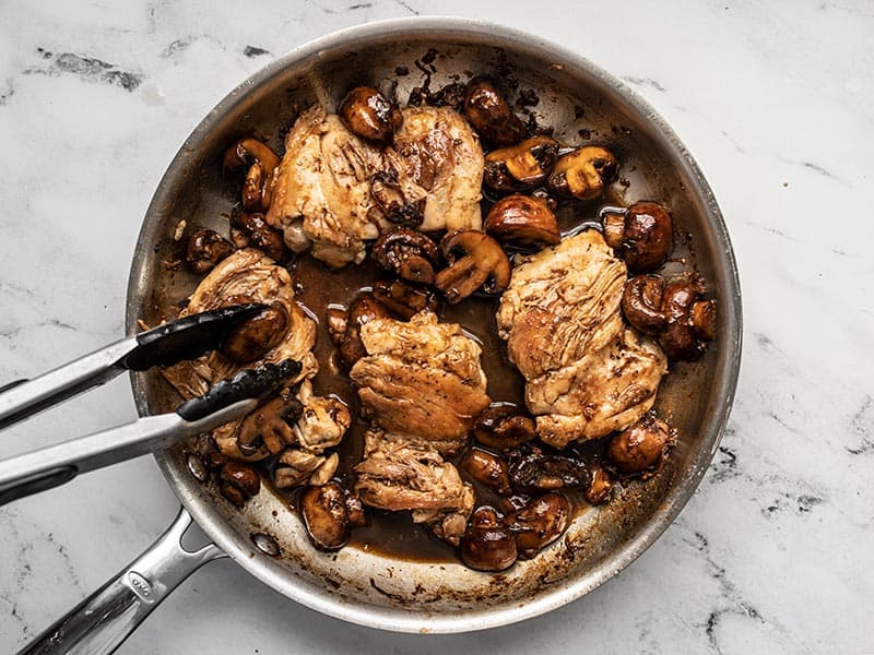 Chicken added back into the skillet with the mushrooms and balsamic sauce