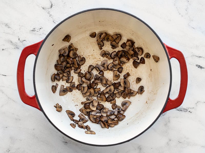 Sautéed mushrooms in soup pot