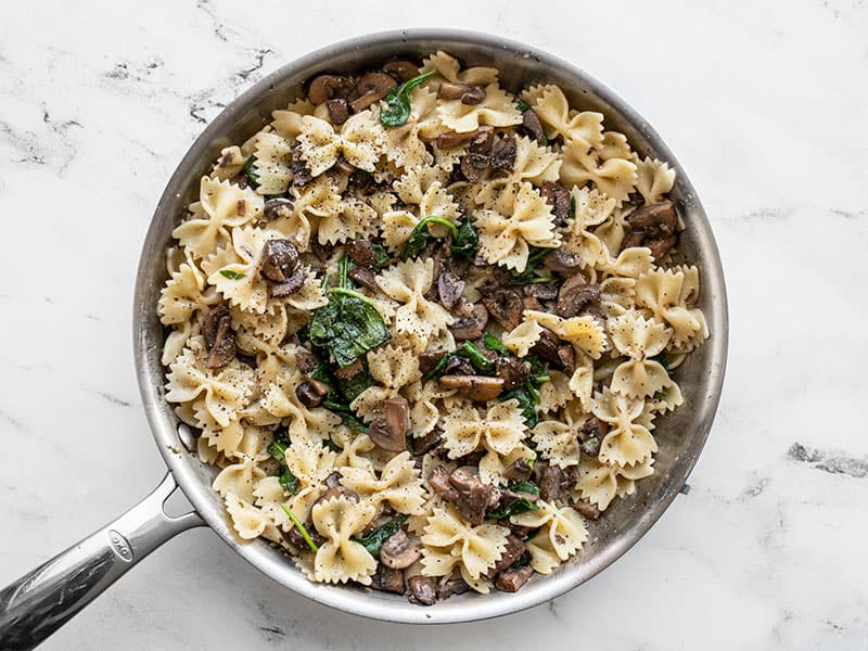 Stir cooked pasta into skillet