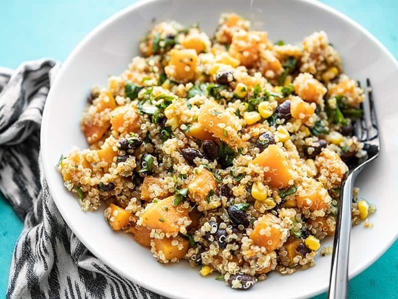 Side view of a bowl of Chipotle Butternut Squash and Quinoa Salad