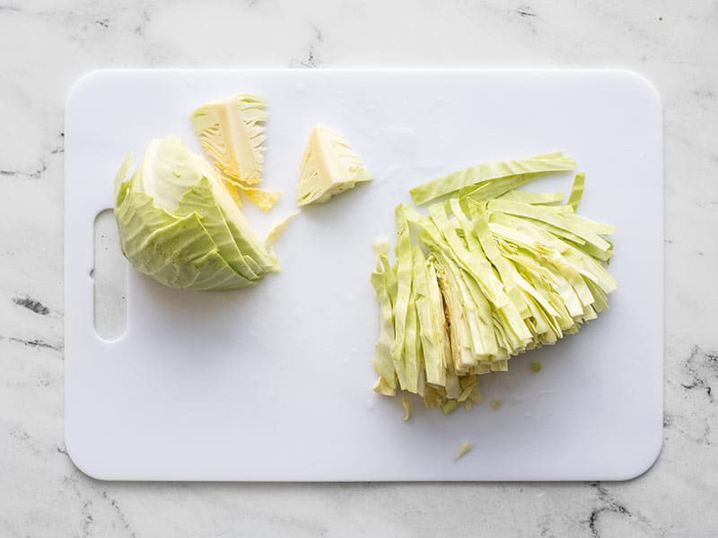 Sliced green cabbage on a cutting board