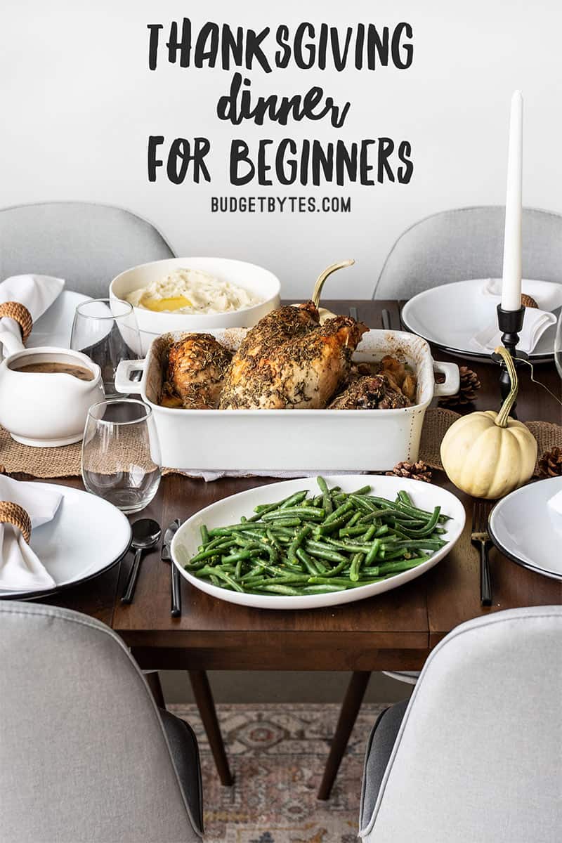 Side view of a simple Thanksgiving dinner table with title text at top