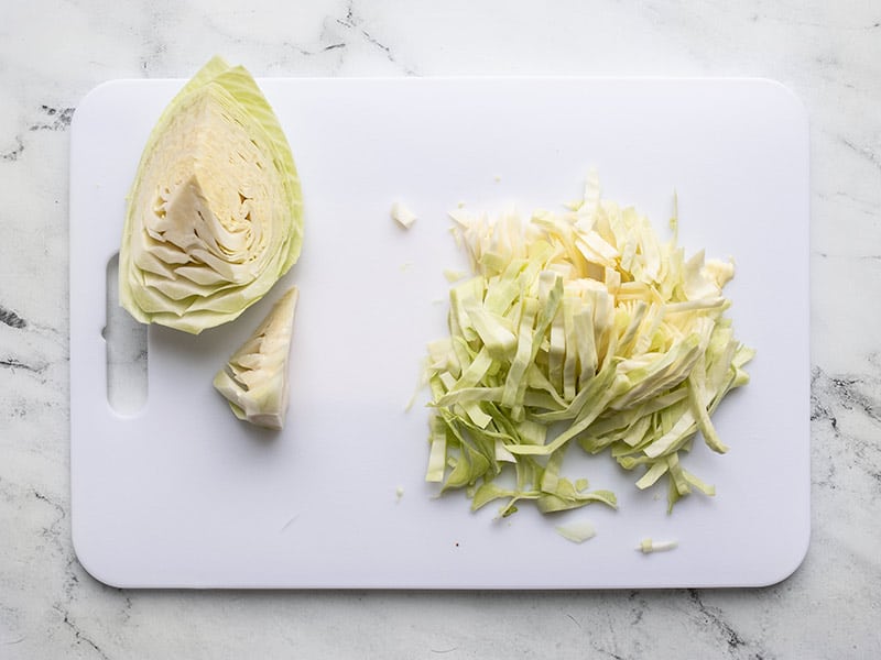 Sliced cabbage on a cutting board