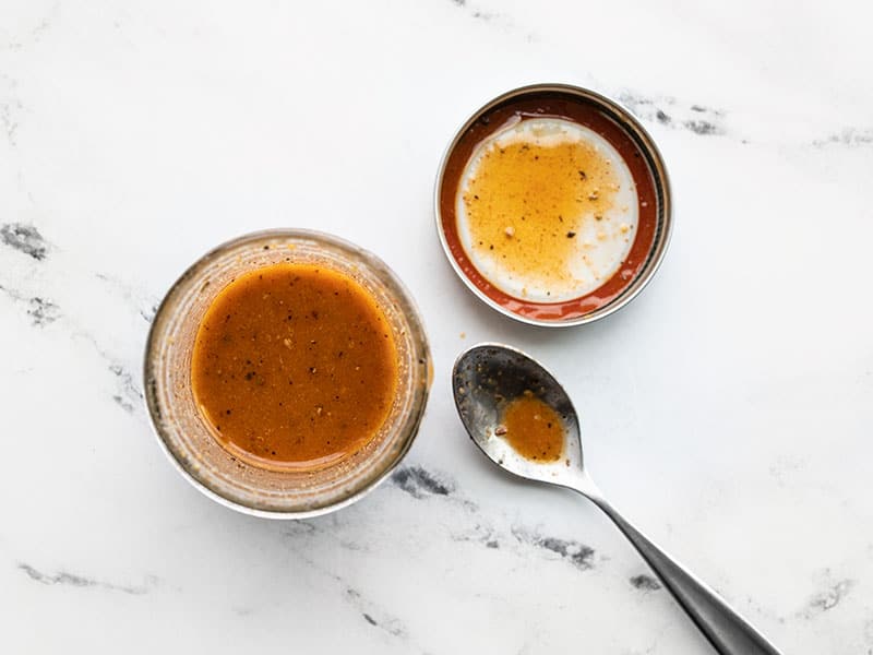 Smoky vinaigrette in a mason jar with spoon