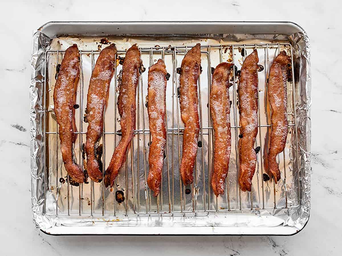 Fully baked bacon on the baking sheet. 