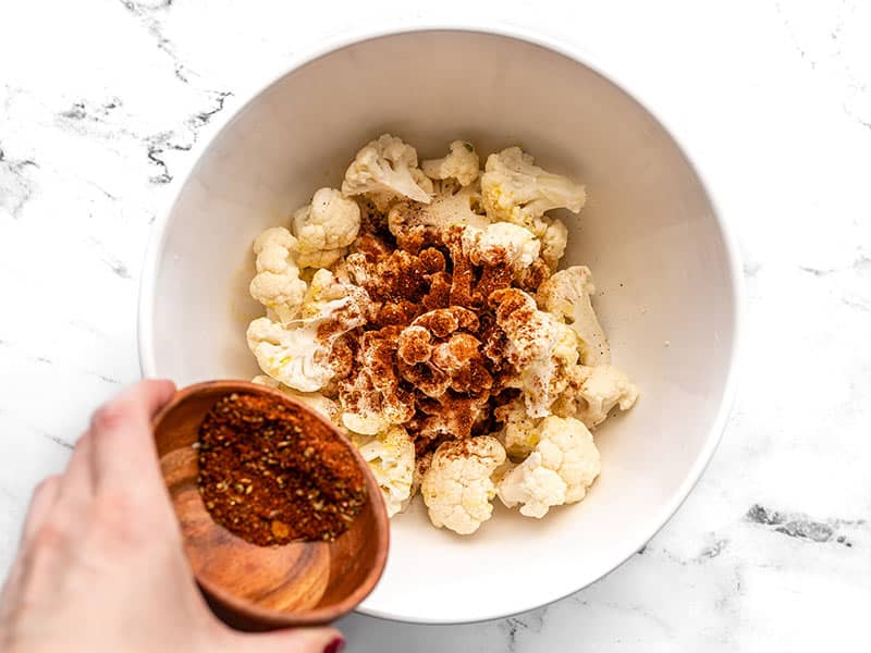 Season cauliflower florets with taco seasoning