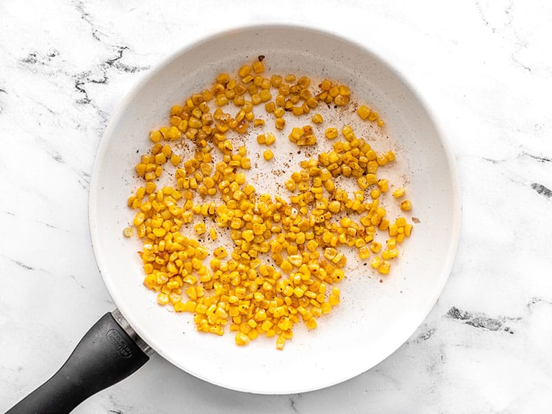 Blistered corn in a skillet