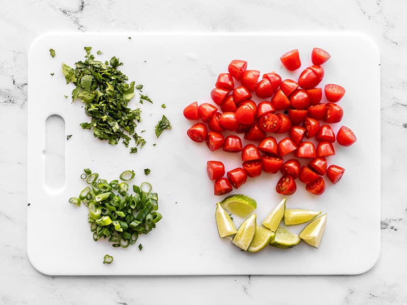 Chopped fresh toppings for cauliflower bowls