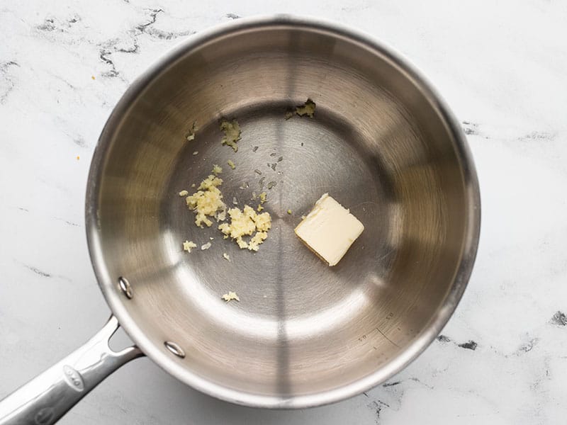 Garlic and butter in sauce pot