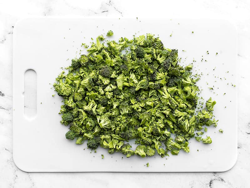 Chopped broccoli on a cutting board