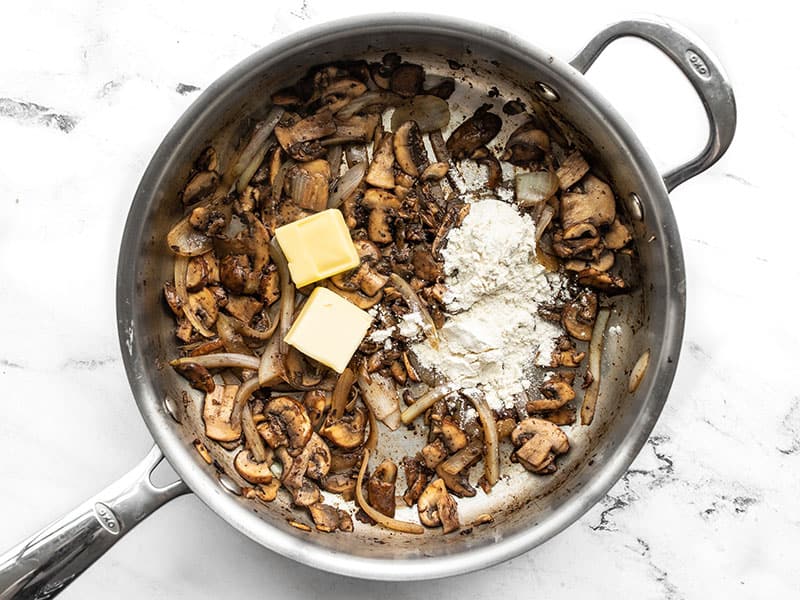 Butter and flour added to the skillet with the mushrooms and onions.