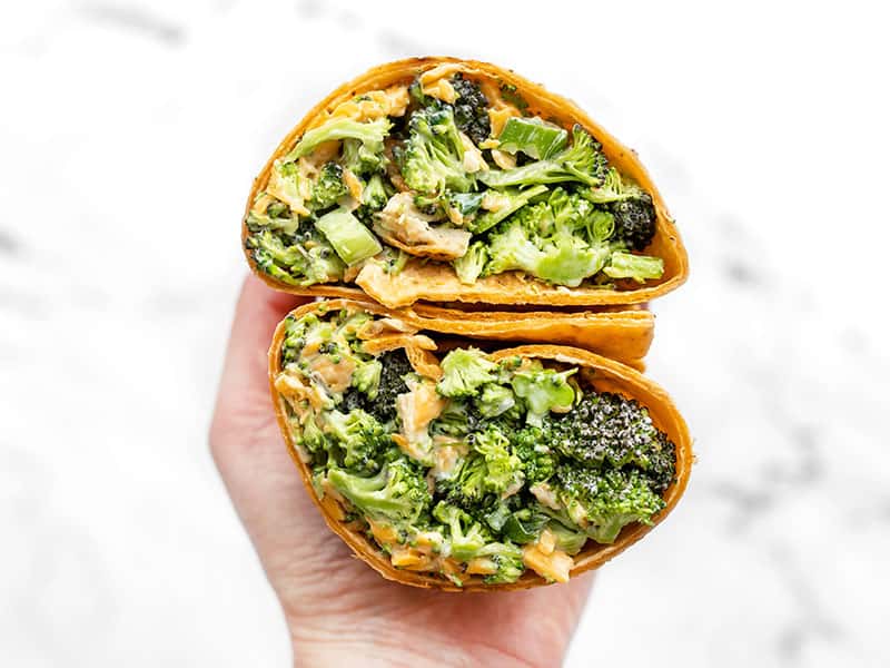 Broccoli Cheddar Chicken Salad in a wrap sandwich, open and facing the camera close up