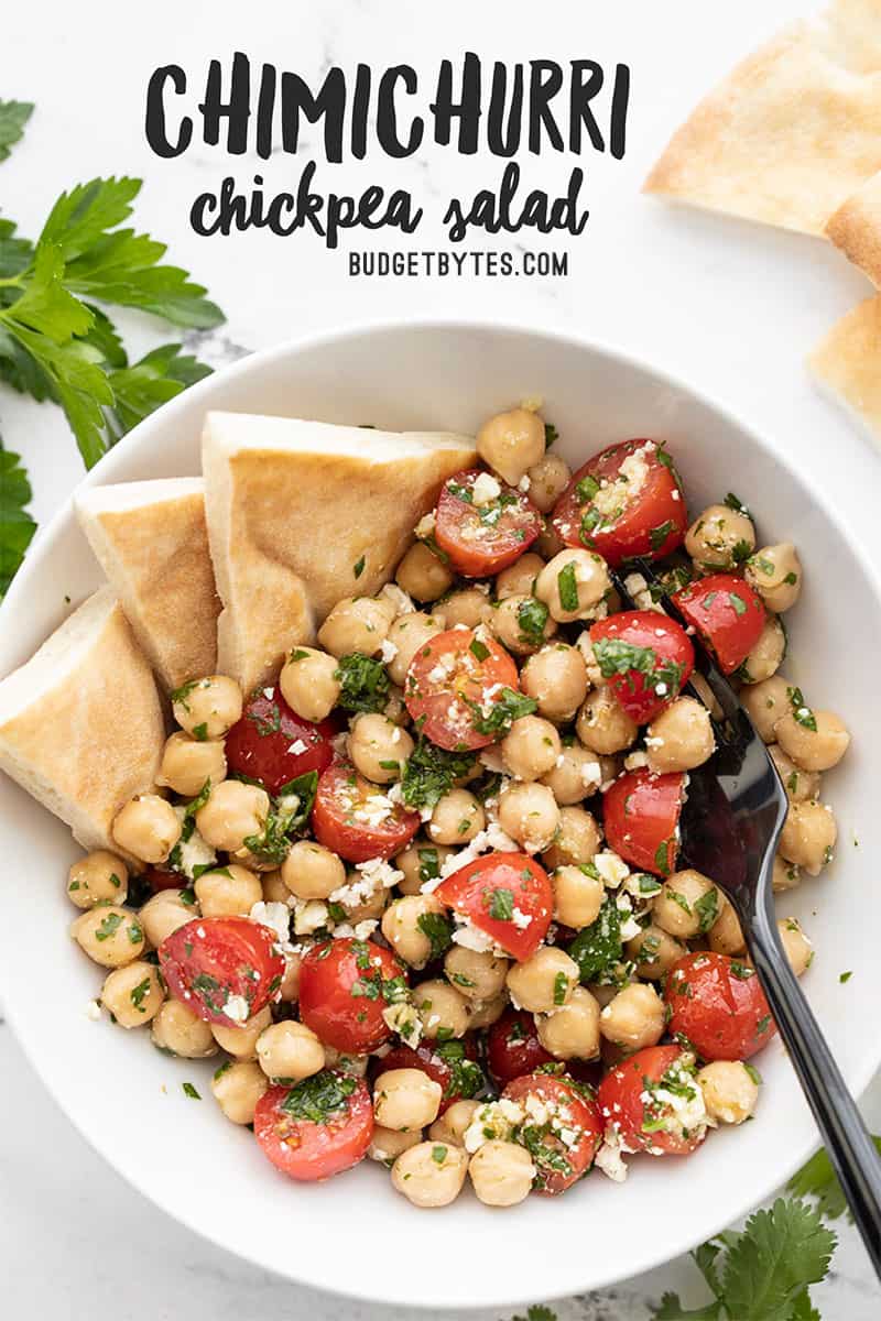 Overhead view of a bowl full of chimichurri chickpea salad with title text at the top