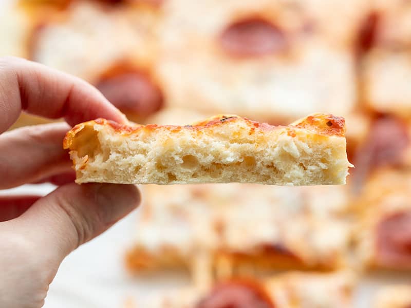 Inside look at a piece of no yeast pizza crust