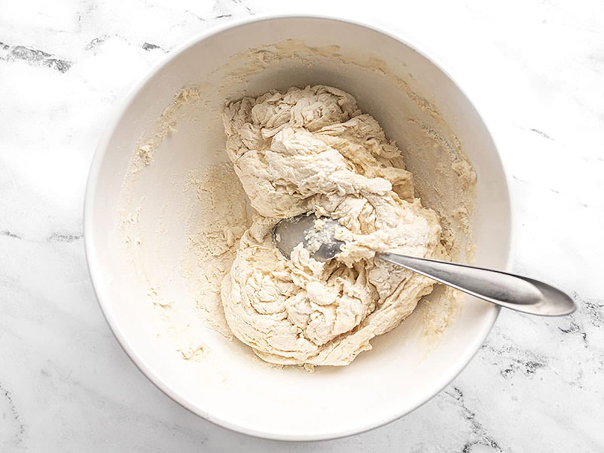 Dry shaggy focaccia dough in the mixing bowl.