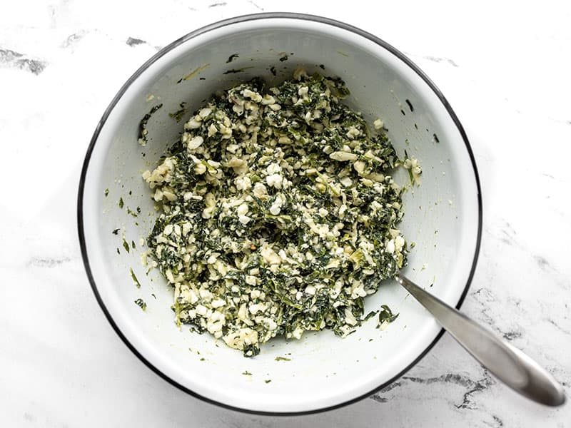 Mixed spinach and cheese filling in the bowl