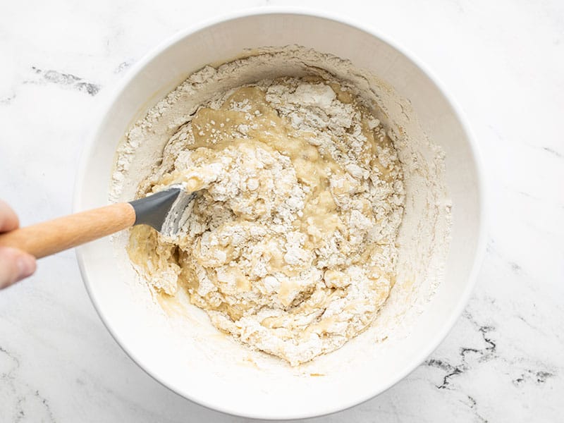 Wet and dry ingredients being stirred together